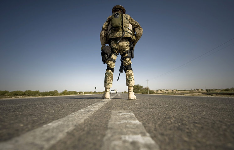 Afghanistan: 15 October 2009: A German soldier mans a checkpoint in Balkh