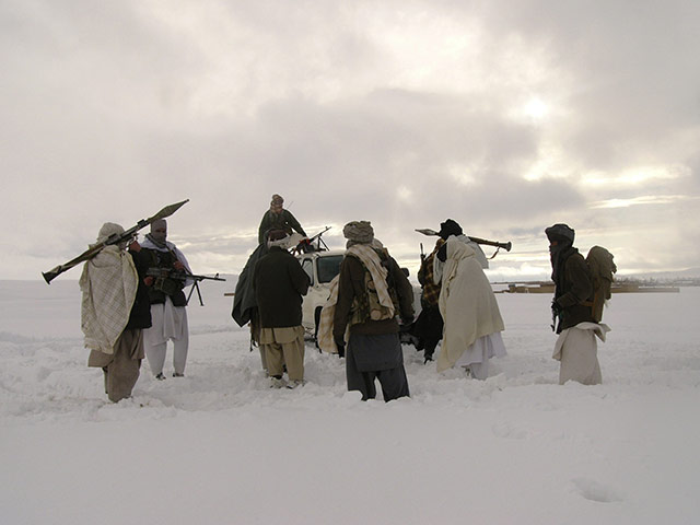 Afghanistan: 17 January 2009: Taliban militants with their weapons
