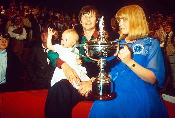 Alex Higgins: 1982: Alex Higgins holding the World Snooker Championship trophy