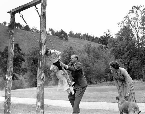 British Monarchy Flickr: The Duke of Edinburgh pushes Prince Charles and Princess Anne on a swing