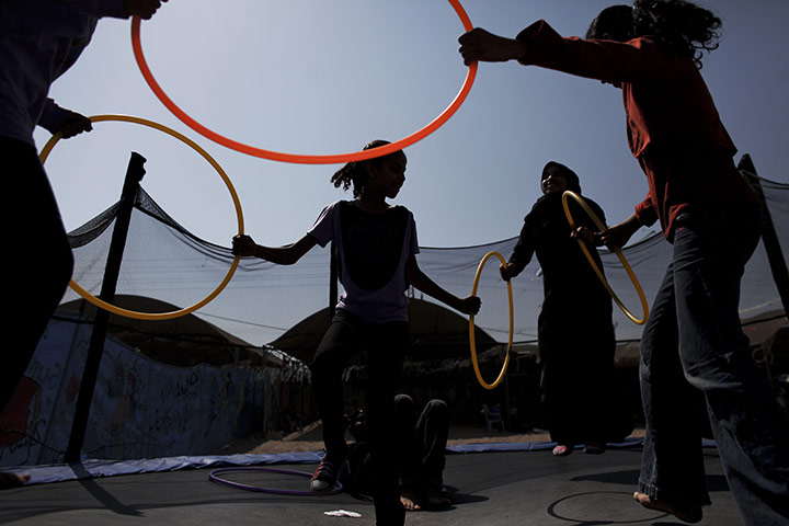 24 hours in pictures: Palestinian children play at UNRWA camp for girls in Gaza City