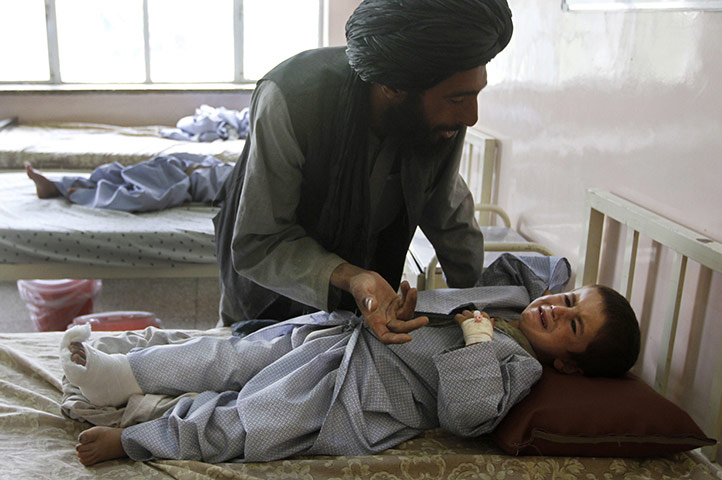 Sangin incident: Abdul Ghafaar  comforts his 7 year old nephew