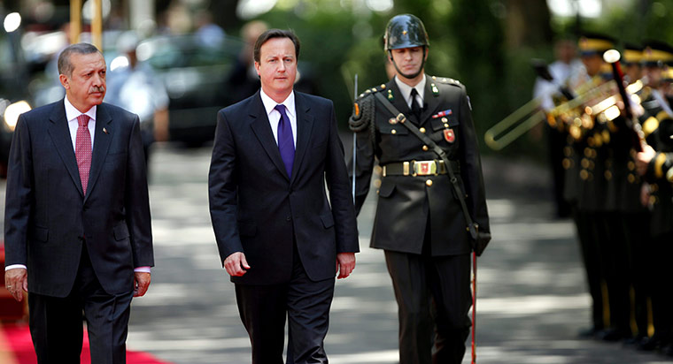 David Cameron on tour: 27 July: David Cameron inspects a honour guard with Recep Tayyip