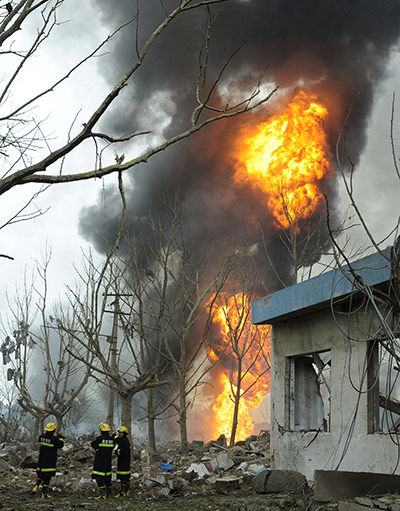 china factory explosion: Fire burns at the explosion site at a plastics factory in Nanjing