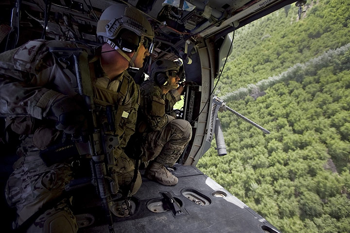 Sean Smith in Afghanistan: Medevac troops look out from their Pavehawk helicopter