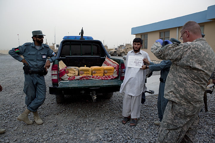Sean Smith in Afghanistan: American soldier photographs a man arrested with containers of explosives