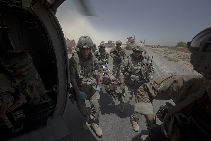 Sean Smith in Afghanistan: Medevac troops evacuate a wounded Afghan civilian contract truck driver