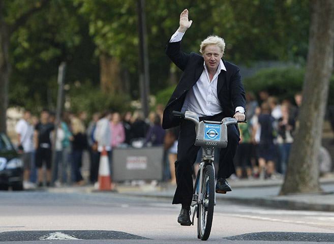 London cycle hire: Mayor Boris Johnson waves to the media as he launches a cycle hire scheme