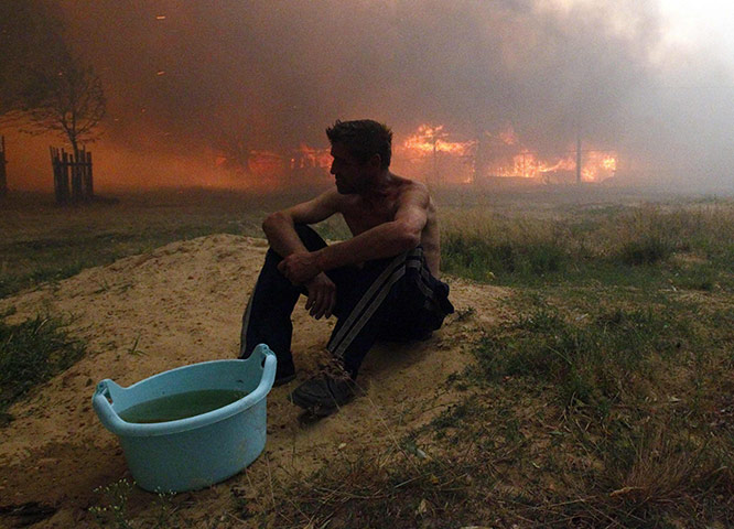 24 hours in pictures: wildfires in central russia