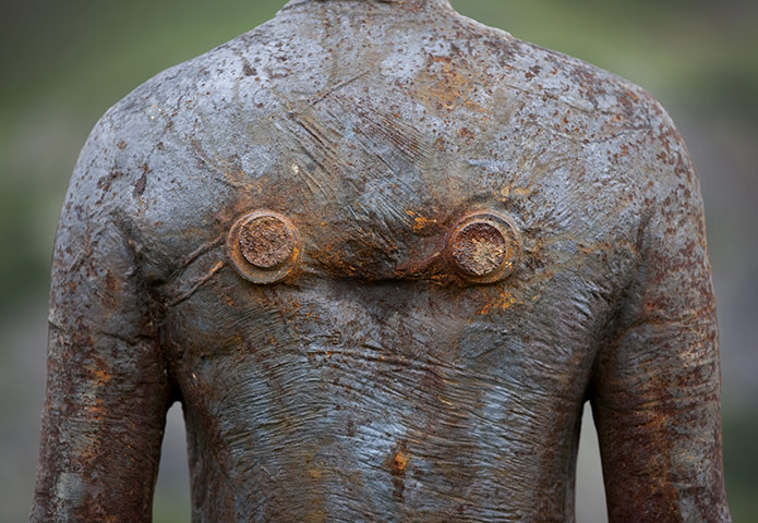 Anthony Gormley: A Figure at Kriegeralpe, near Lech 'Horizon Field' by Anthony Gormley