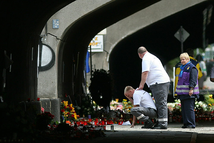 Love Parade: Rescue helpers mourn on July 31, 2010 at
