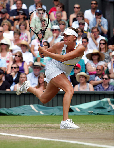 Wimbledon women's final: Vera Zvonareva plays a backhand return