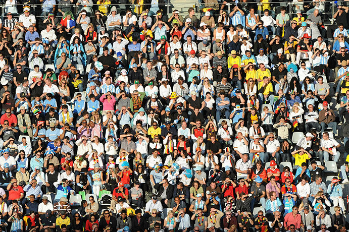 World Cup Quarter-Finals: Football fans sit in the stands