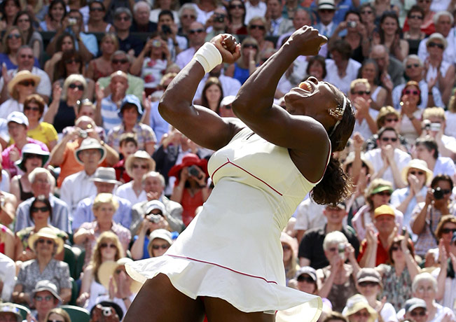 Serena wins wimbledon: Serena Williams celebrates winning the Wimbledon womens' singles final 