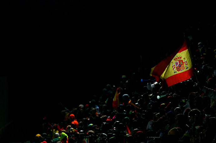 Paraguay versus spain: Spanish flag waved by a fan
