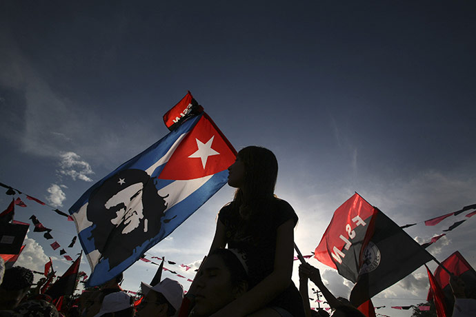 24 hours in pictures: Managua, Nicaragua: A Sandinista supporter takes part in celebrations