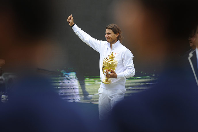 Men's singles final: Rafael Nadal parades around Centre Court with the trophy