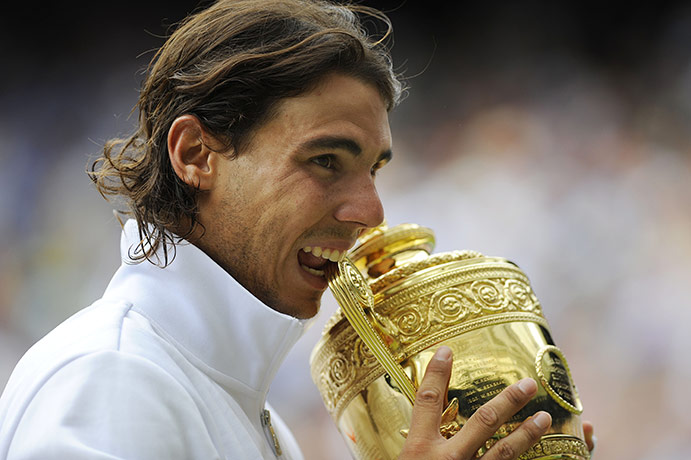 Men's singles final: Rafael Nadal parades around Centre Court with the trophy