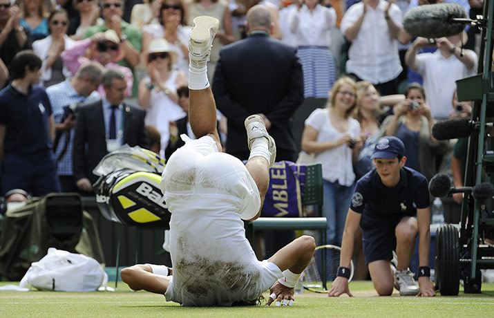Men's singles final: Rafael Nadal performs a forward roll in celebration