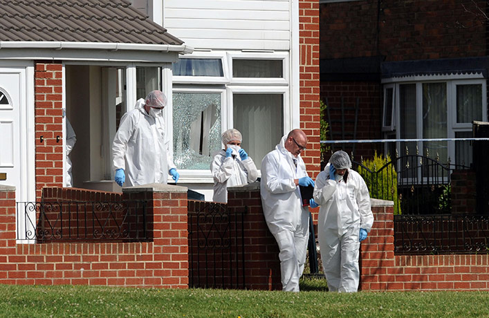 Raoul Moat shootings: Police forensic officers work at a house in Birtley Gateshead