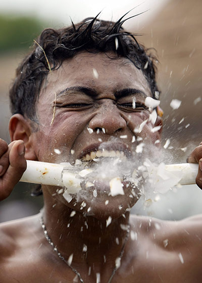 24 hours in pictures: Indonesian man showing his traditional martial arts skills