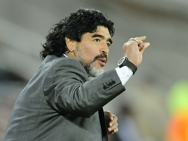 sport: Argentina's coach Diego Maradona gesture