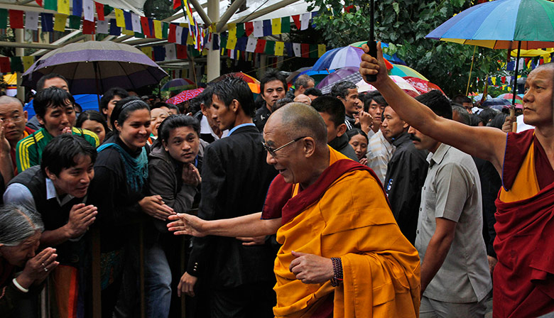 Moat: Dalai Lama is greeted by people in Dharmsala, India on his 75th birthday