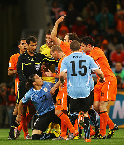 Holland versus Uruguay: Wesley Sneijder gets booked for shoving Martin Caceres