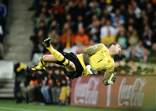Holland versus Uruguay: Netherlands' goalkeeper Maarten Stekelen fails to stop Forlan's shot