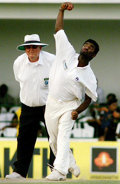 Muttiah Muralitharan: Sri Lankan Off Spinner Muraitharan bowls against Zimbabwe in Galle