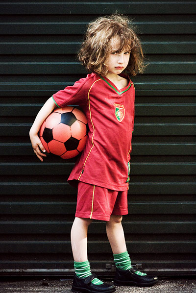 in pictures: football: Girl in Portugal football strip