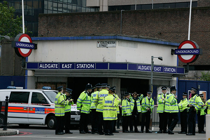 7/7 5th annivesary: 5 July 2005: Police outside Aldgate East tube station