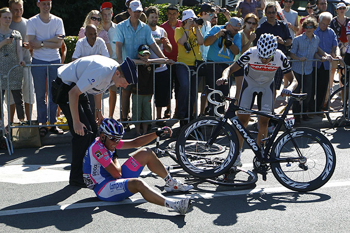 TDF Crashes: Italy's Mirco Lorenzetto receives as