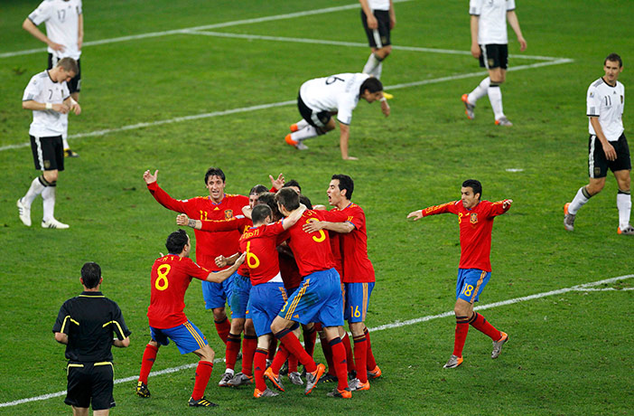 footy: Spain's players celebrate