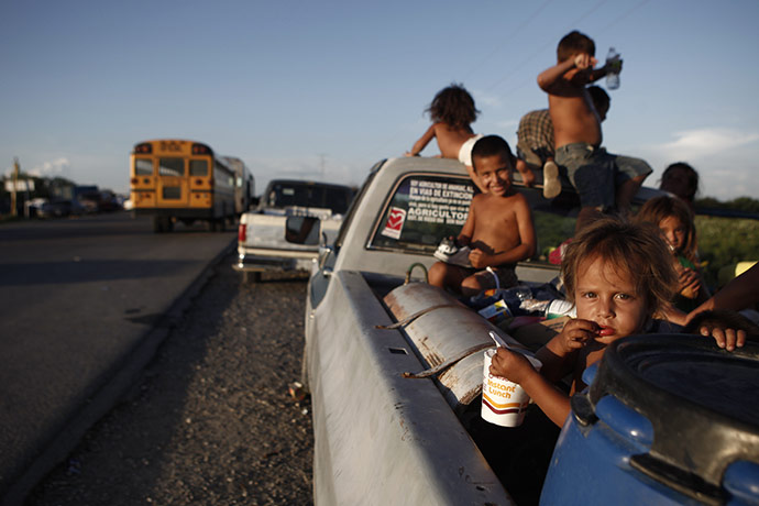 24 hours in pictures: children evacuated from Ciudad Anahuac, MExico