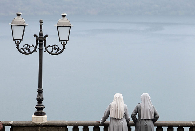 24 hours in pictures: Castel Gandolfo, Italy: Nuns admire the lake