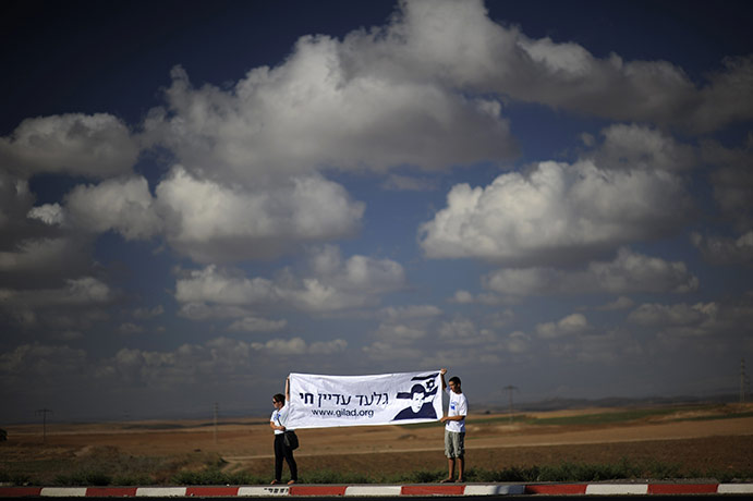 Gilad Shalit march: Israelis hold a banner
