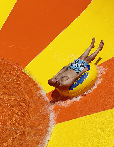 24 hours in pictures: Miami, US: A man on a water slide aboard the Norwegian Epic cruise ship