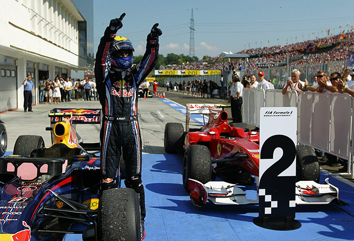 Hungarian grand prix: Mark Webber of Australia and Red Bull Racing celebrates in parc ferme