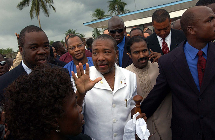 Charles Taylor Retro: Charles Taylor is escorted to exile in Nigeria