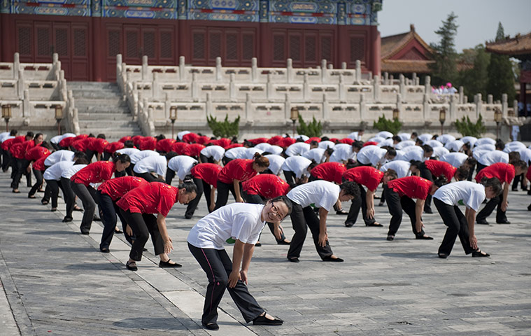 Radio exercise in China: A demonstration in Beijing's Tai temple square