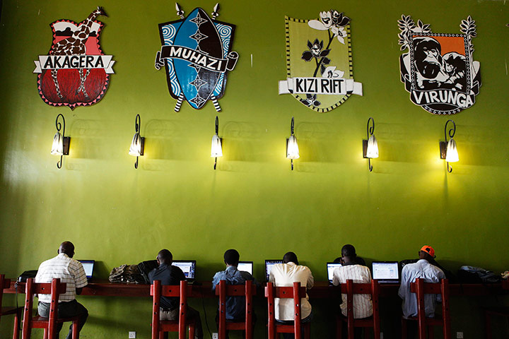 24 hours: People surf the internet at a free Wi-Fi spot at Kigali airport
