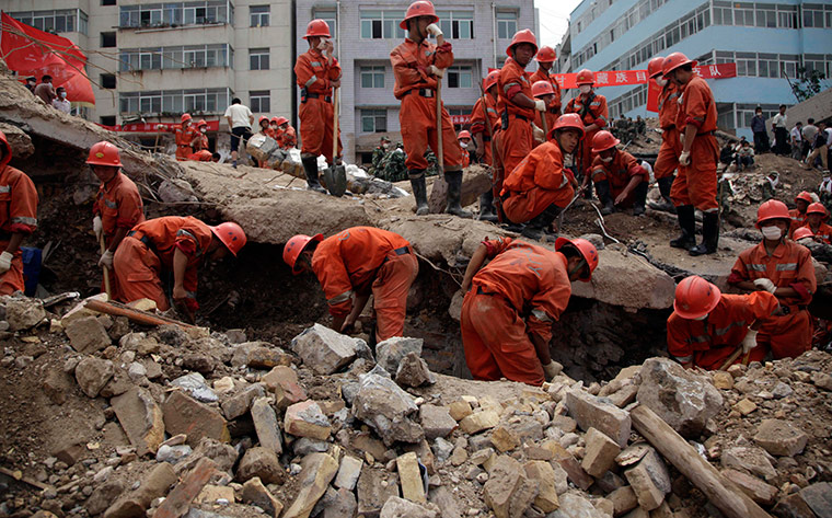 China update: Rescue workers search for victims