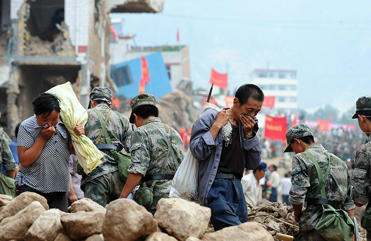 China update: Residents cover their noses from the smell, China