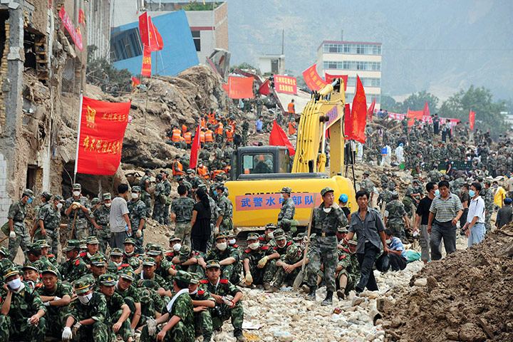 China update: Chinese military personnel help with rescue and cleanup operations