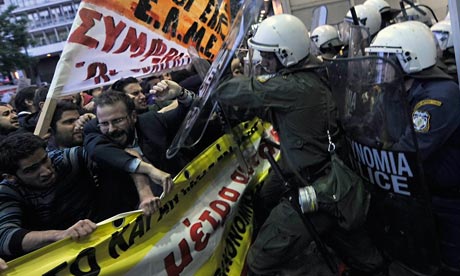 Protesters clash with riot policemen in Athens