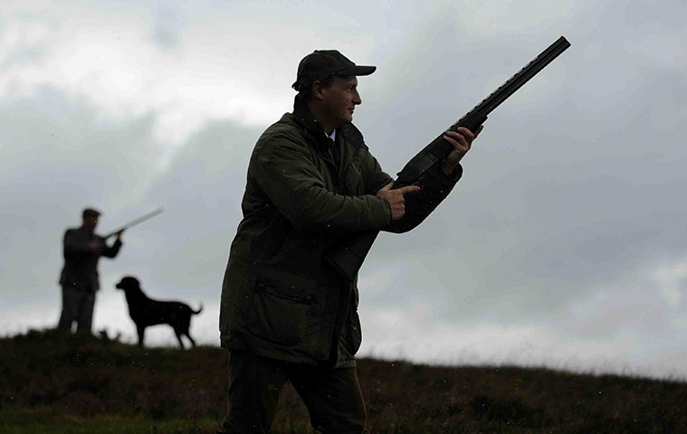 Grouse shooting : Gamekeepers Bob Pirie and Adam Smith on a moor before the grouse season