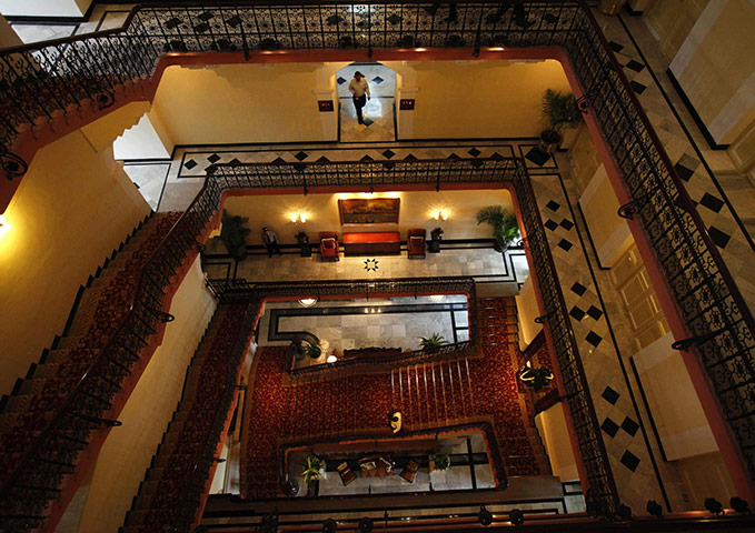 Taj Mahal Palace hotel: Employees of the Taj Palace Hotel inside the heritage wing of the hotel