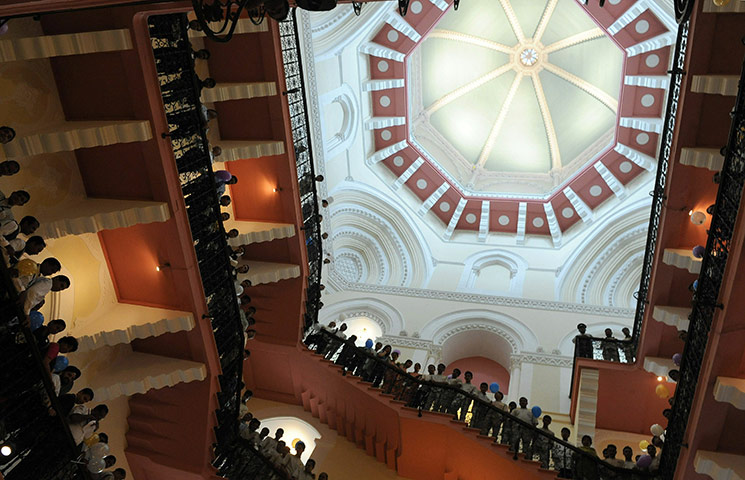 Taj Mahal Palace hotel: Hotel staff line the grand cantilever staircase