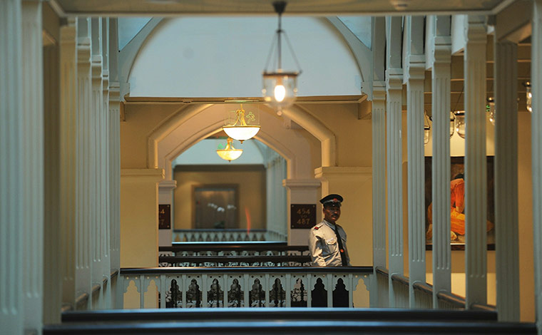 Taj Mahal Palace hotel: A security guard walks through the newly-restored heritage wing